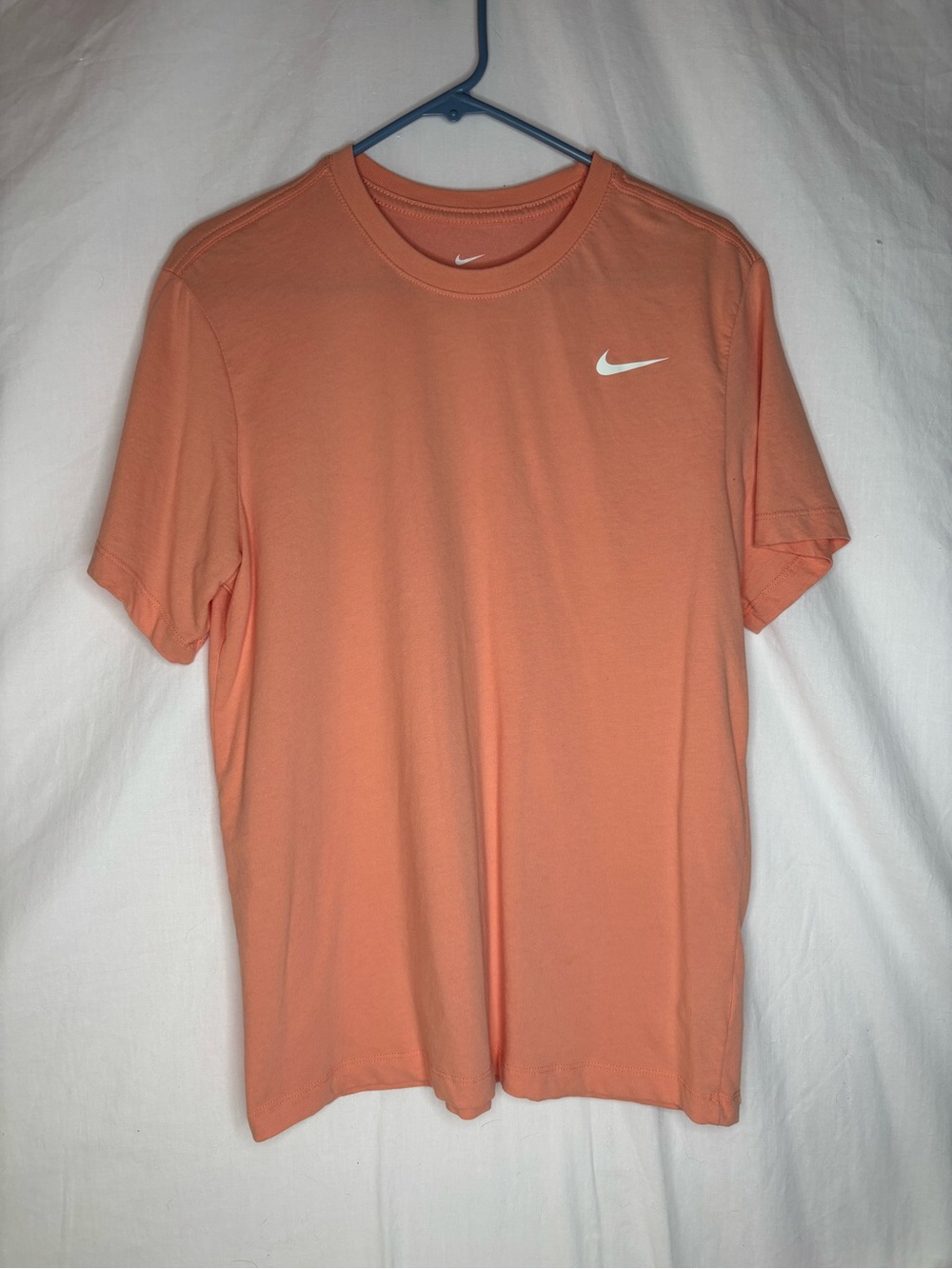 Nike women’s sizeM T-shirt The Nike Tee DRI-FIT short sleeve orange pulse color